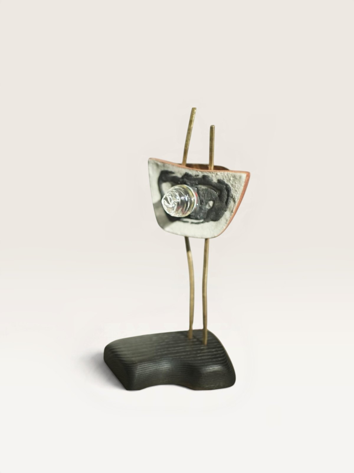 Mixed-material sculptural table object